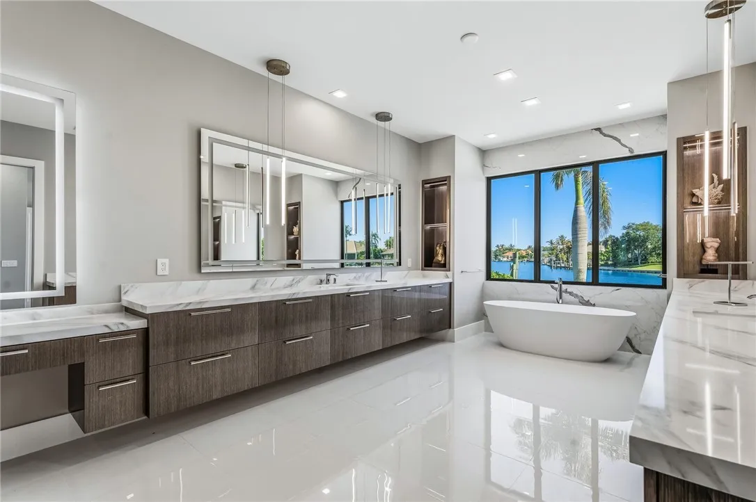Marble master bath with freestanding tub