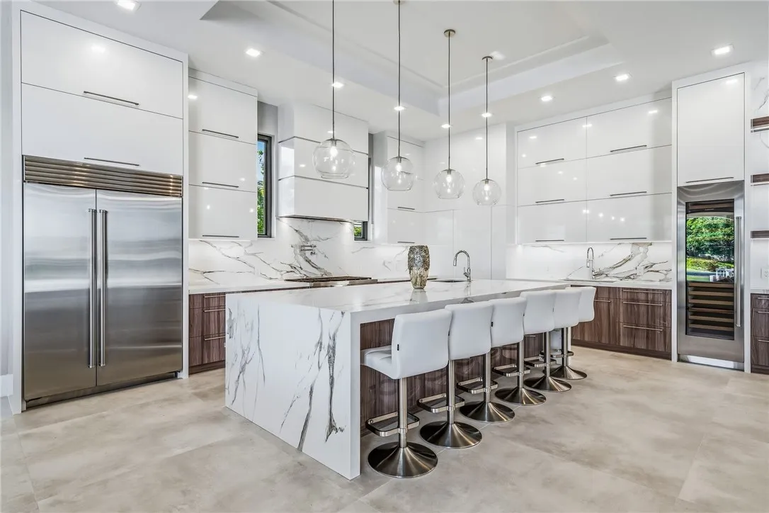 Kitchen with waterfall quartz island